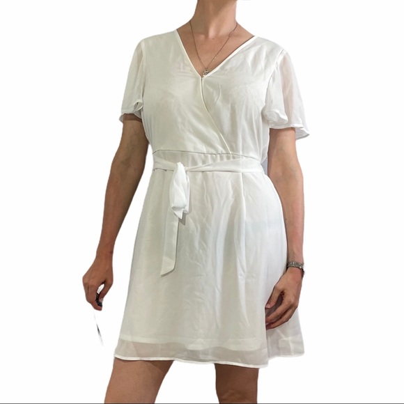Maurices Dresses & Skirts - MAURICES White Bell Sleeve Surplice Dress Small